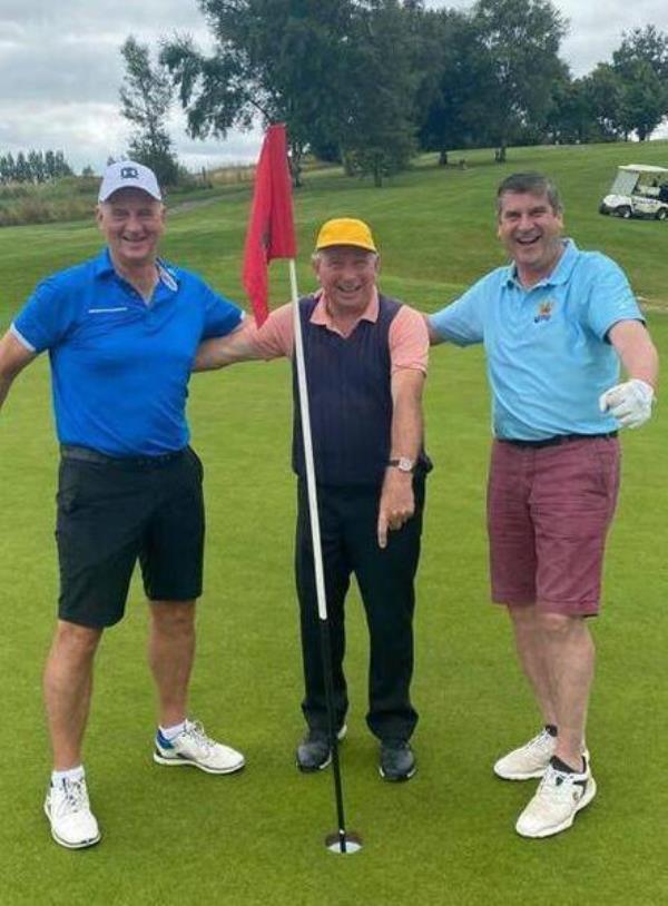 Johnny Flaherty (centre) with Offaly greats Joe Dooley (L) and Michael Duignan (R) after Flahery's hole-in-one at Esker Hills Golf Club. Johnny Flaherty (centre) with Offaly greats Joe Dooley (L) and Michael Duignan (R) after Flahery's hole-in-one at Esker Hills Golf Club.